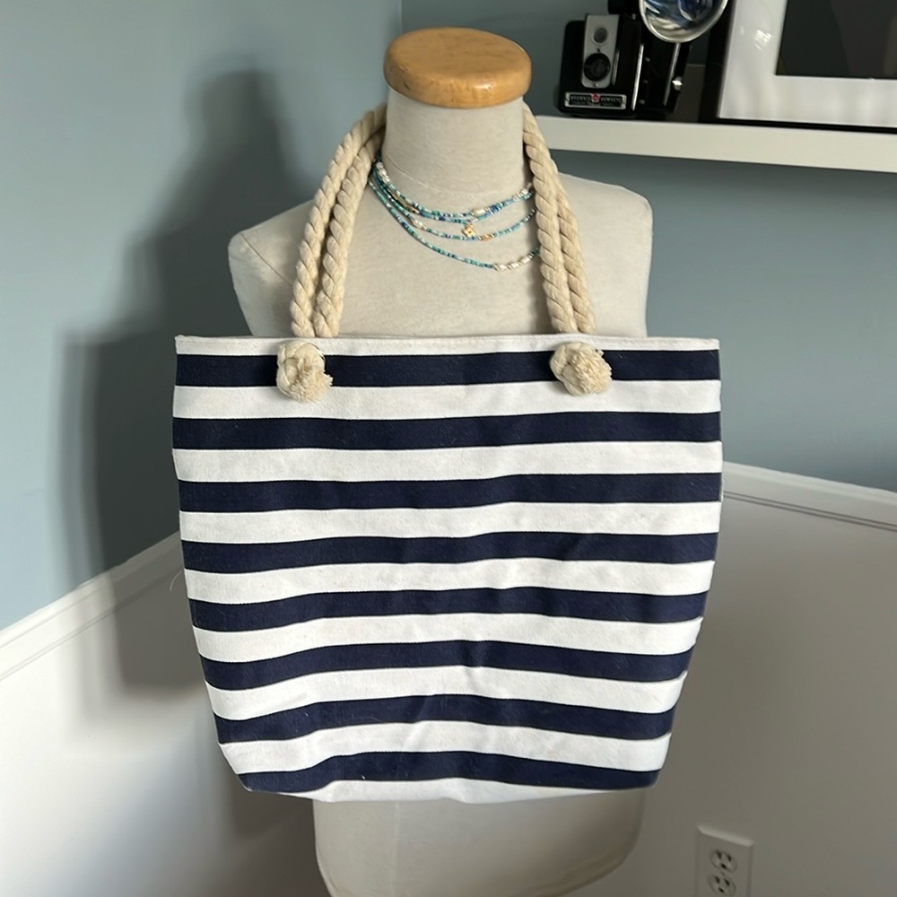 Striped bag - zipper closure, lined interior, rope handles.